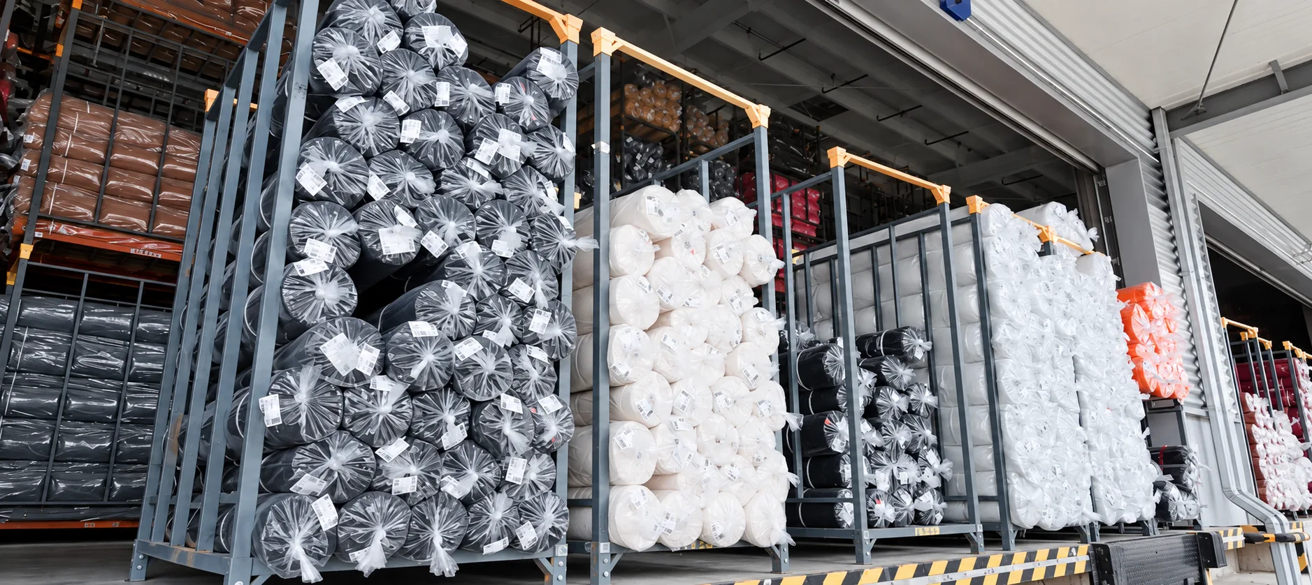 Fabric rolls at the factory dock